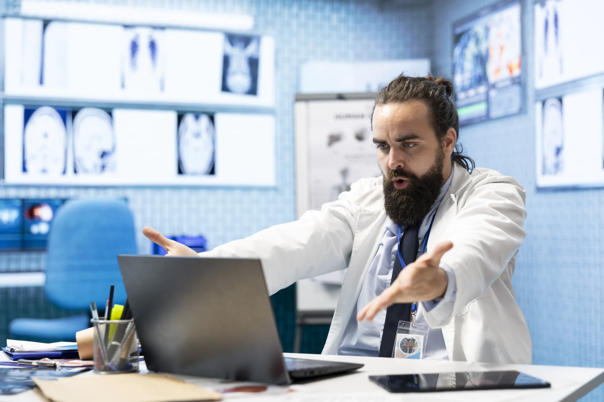 A pharmaceutical OEM engineer looking frustrated at a laptop screen, representing why generalist marketing agencies fail to meet high-compliance Bio-Pharma standards.