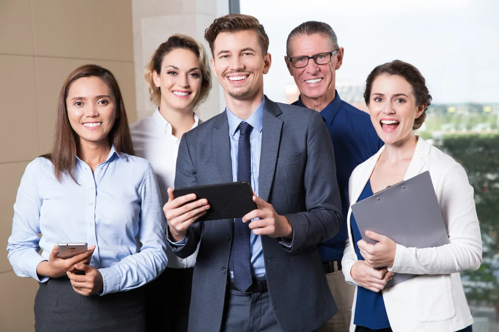 The Pixerts diverse leadership team and industrial design specialists in a professional office setting.